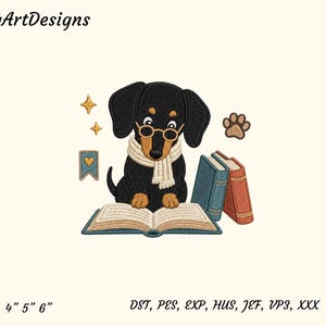 May include: An embroidery design featuring a black dachshund wearing round glasses and a cream-coloured scarf, reading an open book. Beside the dog are two closed books, a blue bookmark with a heart, two yellow stars, and a brown paw print. Text reads DungArtDesigns and 4" 5" 6" DST, PES, EXP, HUS, JEF, VP3, XXX.