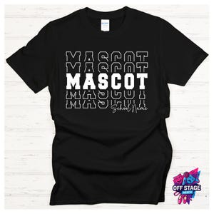 May include: Black t-shirt with the word "MASCOT" in white block letters, repeated vertically. The text "School Name" is below the word "MASCOT". The shirt is a Gildan brand.