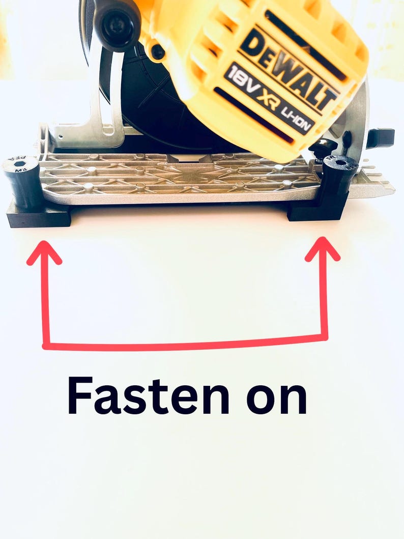 May include: A yellow and black DeWalt 18V XR Li-Ion circular saw. The saw is on a silver base with black supports. The text "Fasten on" is below the saw.