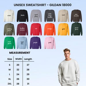May include: A display of Gildan 18000 unisex sweatshirts in various colors, including white, black, and red. The image also shows a size chart with measurements in inches, ranging from size S with a 20-inch width and 27-inch length to 2XL with a 28-inch width and 31-inch length.