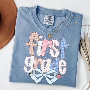 Comfort Colors® First Grade Teacher Shirt, Back to School 1st Grade Tee, Teacher Appreciation Gift, Cute Elementary School, Coquette Bow