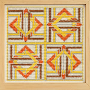 May include: A framed needlepoint artwork featuring a geometric design. The design is divided into four quadrants, each with a repeating pattern of yellow, orange, and brown lines on an off-white background. The frame is made of light-colored wood.