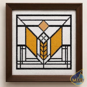 May include: Framed cross-stitch art featuring a geometric design in black, white, and yellow. The artwork is framed in a dark brown wooden frame. The design includes diamond and angular shapes.