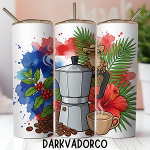 May include: White tumbler with a design featuring a coffee pot, coffee beans, a frog wearing a hat, and a cup of coffee. The design includes red, blue, and green watercolor elements. The text "DARKVADORCO" is at the bottom.