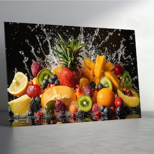 May include: A vibrant still life featuring a variety of fresh fruits, including pineapple, strawberries, kiwi, oranges, and berries, with water splashing in the background. The fruits are arranged on a reflective surface against a black backdrop.