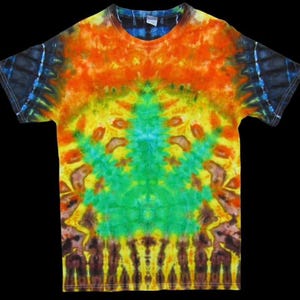 May include: A colorful tie-dye t-shirt with a vibrant pattern. The shirt features a blend of orange, yellow, green, and brown hues, creating a psychedelic effect. The short-sleeved shirt is displayed against a black background.