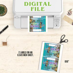 May include: A white printer printing labels with the text "NICK'S 2 BIRTHDAY". The labels are on an 8.5x11 inch sheet. The image also includes the text "DIGITAL FILE" and "8X8".