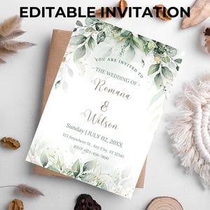 Puede incluir: Una invitación de boda editable con el texto "EDITABLE INVITATION". La invitación presenta un diseño floral con hojas verdes y detalles dorados. El texto dice "You are invited to the wedding of Romana & Wilson".