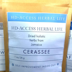 May include: A tan paper bag with a white label featuring the text "HD-ACCESS HERBAL LIFE" and "CERASSEE". The label also states "Dried holistic herbs from Jamaica" and "1 oz/28.g". The bottom of the label reads "SELF-IMPROVEMENT INSIDE-OUT".
