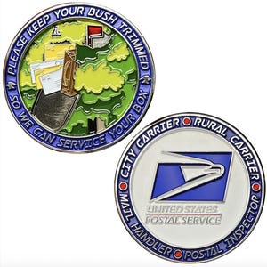 May include: Two-sided coin with a postal service theme. One side features a mailbox with the text "PLEASE KEEP YOUR BUSH TRIMMED SO WE CAN SERVICE YOUR BOX." The other side displays the USPS logo and text "UNITED STATES POSTAL SERVICE."