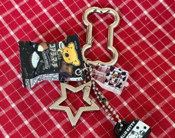 Cool Black Silver Bag Charm Keychain – Retro Hello Kitty and Koala Candy Inspired Accessory with Star and Dice Charms for Bags or Keys