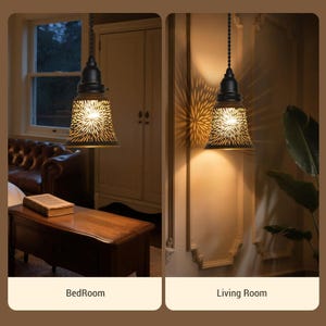May include: Two pendant lights with black metal shades featuring a starburst pattern. The lights are suspended from the ceiling and illuminate the bedroom and living room. The bedroom scene includes a wooden table and a leather sofa.