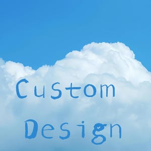 May include: A bright blue sky with fluffy white clouds. The words "Custom Design" are written in a playful, light blue font across the image. The image evokes a sense of creativity and personalization.