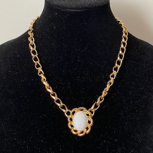 Monet white plastic cabochon pendant necklace