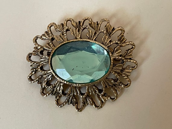 Joan's Collectables blue plastic cabochon brooch