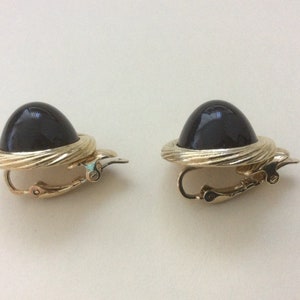Trifari Trifari TM gold plated black cabochon high dome clip-on earrings