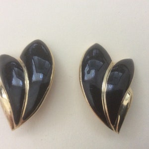 Trifari TM black enamel clip-on earrings