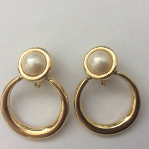 Trifari faux pearl clip-on earrings. 1969-1973