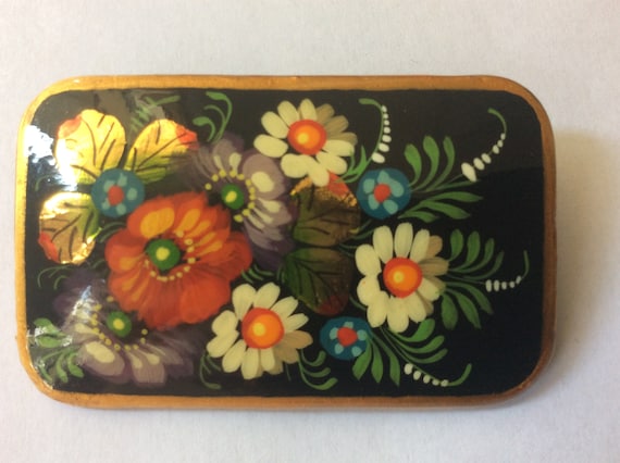 Russian black lacquer paper mache flower brooch. A