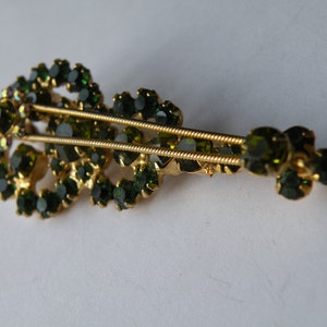 D&E Juliana green olivine aurora borealis violin figural brooch pin.