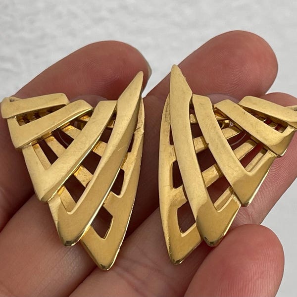 Givenchy gold plated open work wings, winged stud earrings