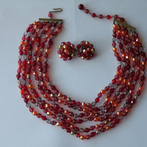 West Western Germany multi-strand pink, red, orange, gold glass beaded necklace, clip-on earrings. Set.
