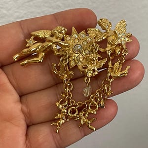 Kirks Folly angels, cherubs star rhinestone brooch Mint