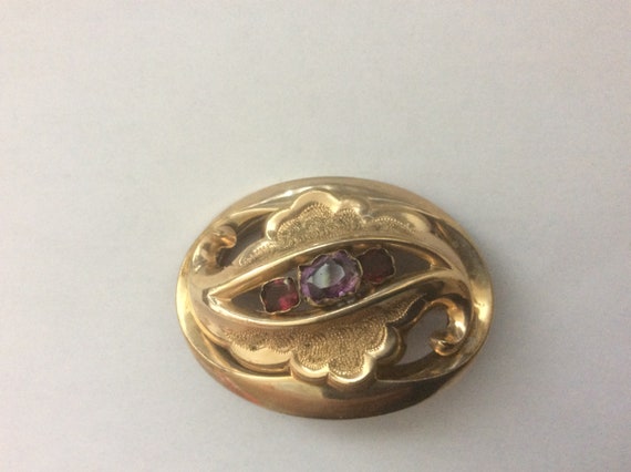 Antique gold filled, amethyst gemstone, garnet color glass brooch