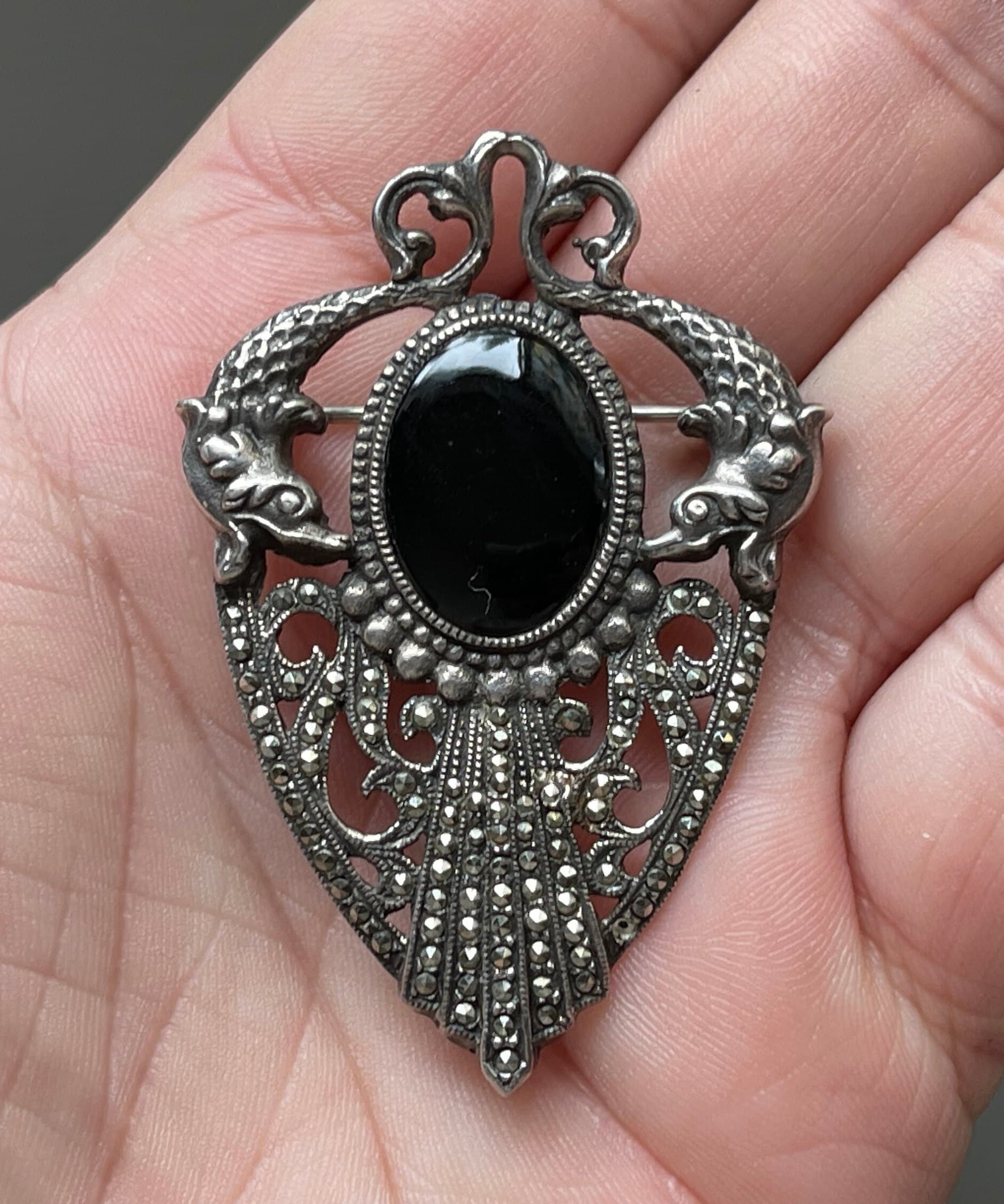 Black and silver brooch best sale