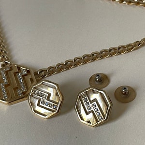 1986 AVON Private Collection  Avon Centennial Gold Tone Curb Chain necklace, stud earrings