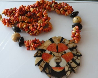 Vintage Apple coral lion  necklace. 1970s