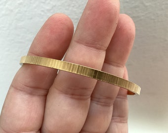 Monet gold plated textured bangle bracelet