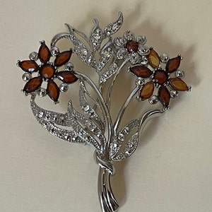 Flower bouquet pin brooch. Amber color rhinestones faux marcasite.