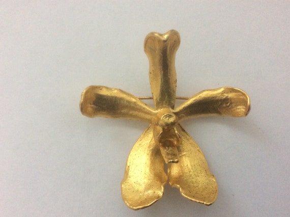 Gold plated best sale brooch