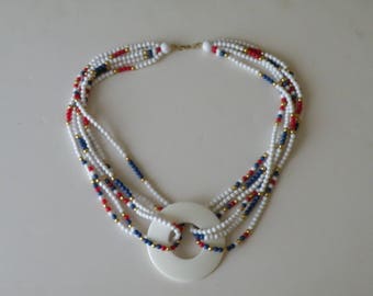 Monet Patriotic Necklace Red, White, Blue beads with gold tone spacers, circle pendant necklace.