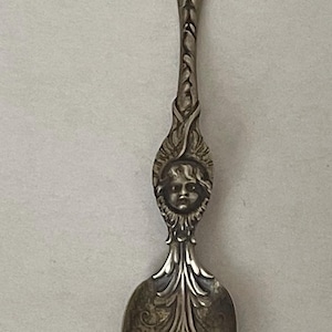 Antique Whiting sterling silver enamel child face, baby face spoon. Demitasse spoon
