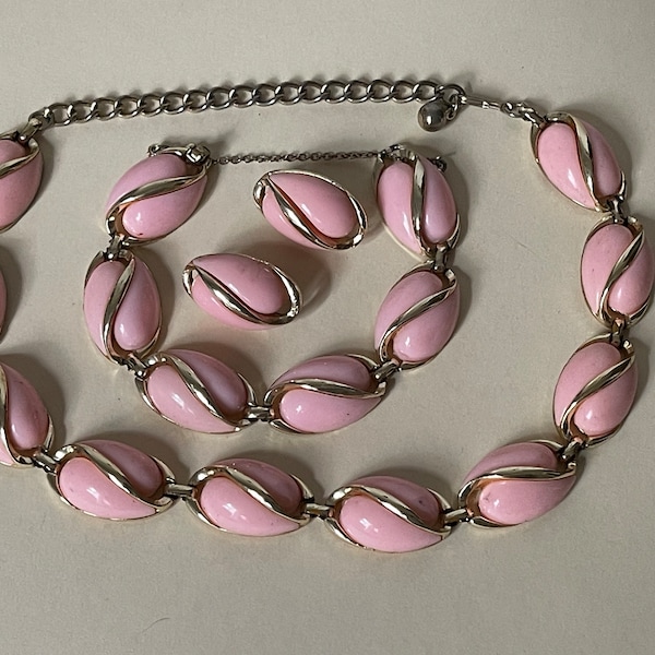 Coro Pink plastic necklace, bracelet, clip-on earrings