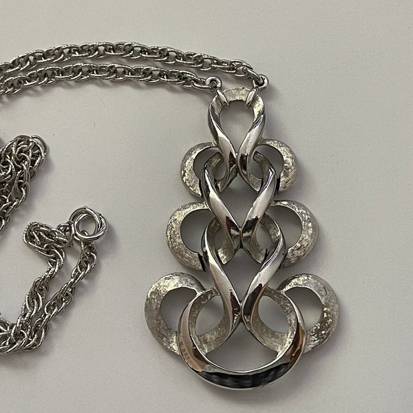 Trifari smooth and matte with texture  silver plated swirl scroll necklace pendant