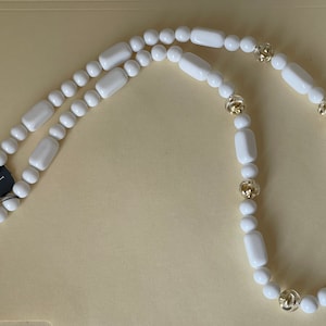 Trifari TM  White plastic, clear plastic lucite  gold tone filled beads necklace # 2