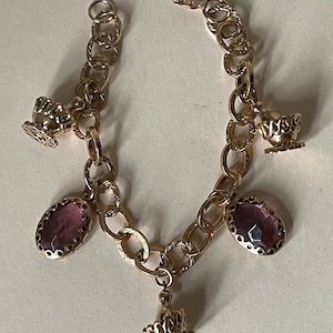 Etched  chain charm bracelet. Purple Rhinestone charms and champagne bottle in ice bucket