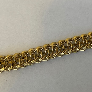 Trifari gold tone chain flexible bracelet, foxtail chain bracelet