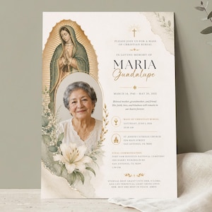 May include: A memorial card with a watercolor illustration of the Virgin Mary and a portrait of an elderly woman. The card includes the text "In Loving Memory of Maria Guadalupe" and details for a Christian burial.