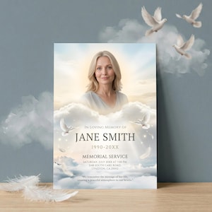 May include: A memorial card featuring a portrait of a woman in a heavenly setting with clouds and doves. The card reads "In Loving Memory of Jane Smith" with dates and service details. The background has a soft, ethereal glow.
