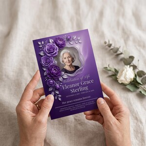 May include: A purple memorial card with a photo of an elderly woman, surrounded by purple roses and leaves. The card reads "Celebration of Life Eleanor Grace Sterling" with memorial service details.
