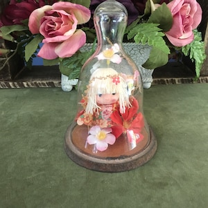 Japanese Doll Inside Glass Bell