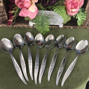 Set of Eight (8) AvonRose Serving or Soup Spoons