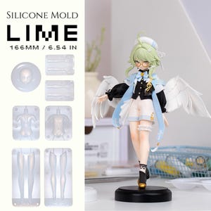 May include: A silicone mould set for crafting a figurine, with the text "SILICONE MOLD LIME 166MM / 6.54 IN". The set includes moulds for the head, torso, and legs. A finished figurine of a character with wings, glasses, and a musical note is also displayed.