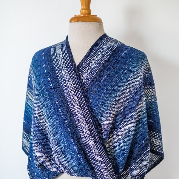 Handwoven Mobius Shawl in Denim, Blue, and White Rayon Yarn. Ribbon highlights in the warp. Wear this shawl all year round. Cozy and easy.