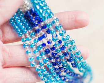 Beaded Bracelet in Blue Glass Beads with a Magnetic Closure. Beachy vibe. Easy to wear. Super comfortable.