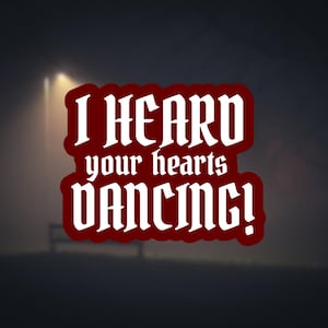 May include: A digitally created image with the text "I HEARD your hearts DANCING!" in a white, gothic-style font, outlined in red. The background is a dark, misty scene with a street light and a bench.
